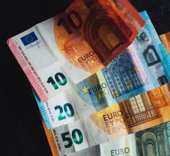 10 euro bill on black textile