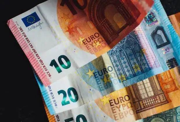 10 euro bill on black textile